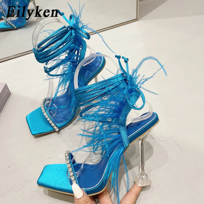 Eilyken Mode Sommer Strass Feder Damen Sandalen Schnürung Cross-Tied Sexy Gladiator Eckige Zehe Damen High Heel Schuhe