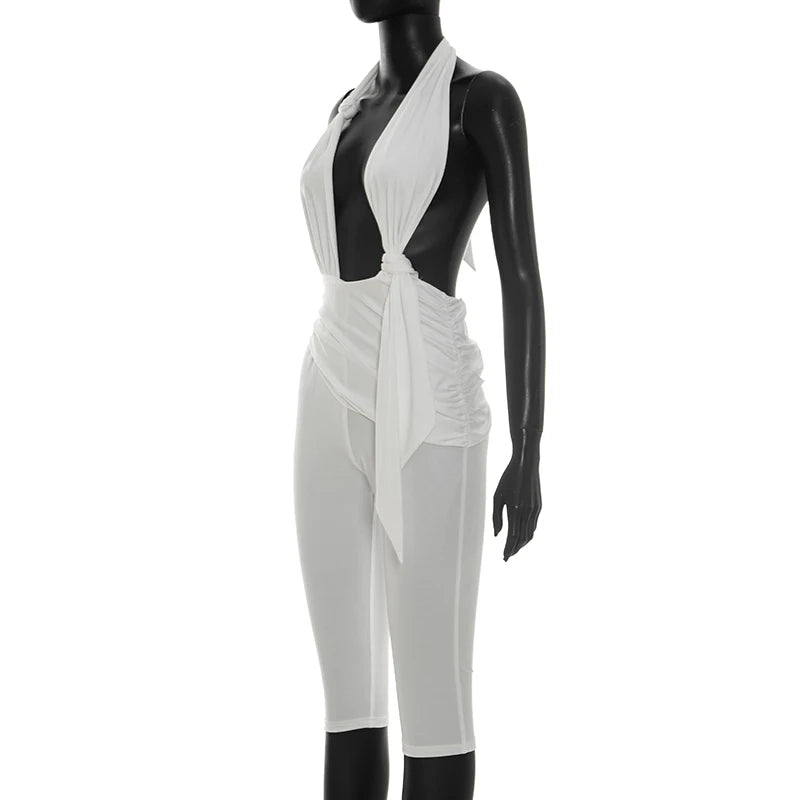 Solid color neck tie, knot, exposed back, tight fitting jumpsuit, cropped pants