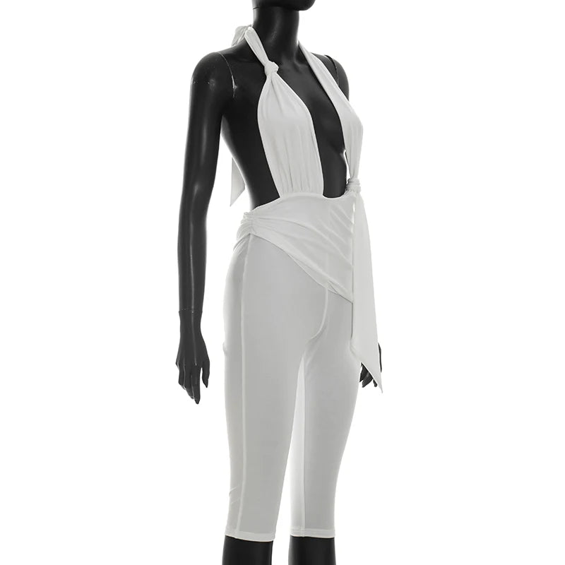 Solid color neck tie, knot, exposed back, tight fitting jumpsuit, cropped pants