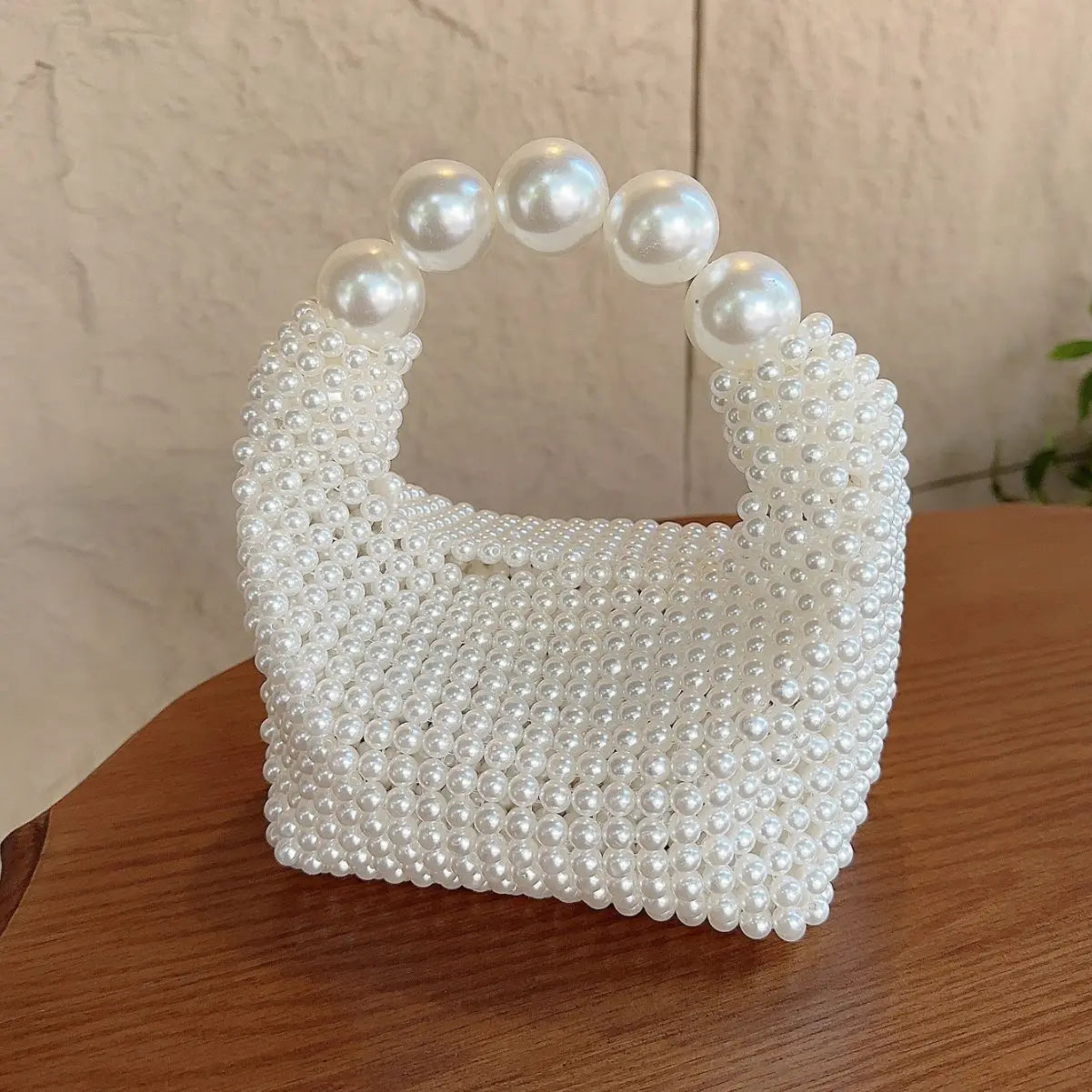 Europäischer und amerikanischer Stil neue Perlenhandtasche Sommer Damen Perlenbeutel handgewebte Handgelenktasche Mode Temperament Handtasche