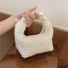 Europäischer und amerikanischer Stil neue Perlenhandtasche Sommer Damen Perlenbeutel handgewebte Handgelenktasche Mode Temperament Handtasche