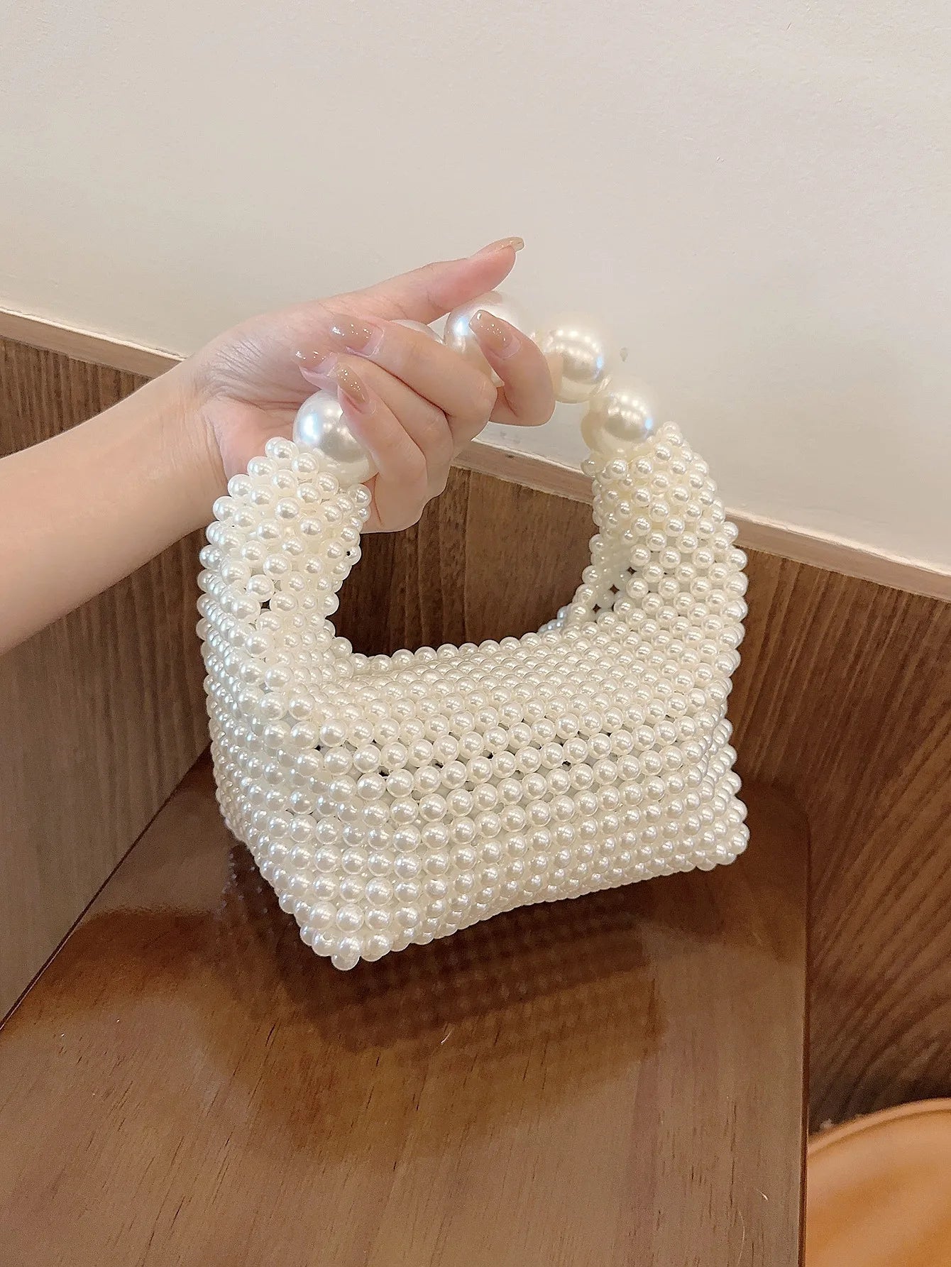 Europäischer und amerikanischer Stil neue Perlenhandtasche Sommer Damen Perlenbeutel handgewebte Handgelenktasche Mode Temperament Handtasche