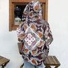 2023 Europäische Station Winter Neue Daunenjacke Damen Warm Mode Kurze Farb-Patchwork Graffiti dicke Weiße Entendaunenjacke