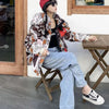2023 Europäische Station Winter Neue Daunenjacke Damen Warm Mode Kurze Farb-Patchwork Graffiti dicke Weiße Entendaunenjacke