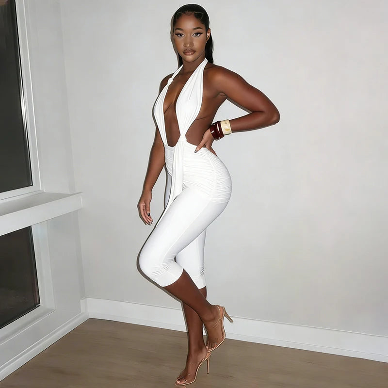 Solid color neck tie, knot, exposed back, tight fitting jumpsuit, cropped pants