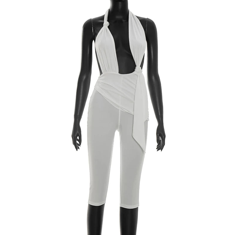 Solid color neck tie, knot, exposed back, tight fitting jumpsuit, cropped pants