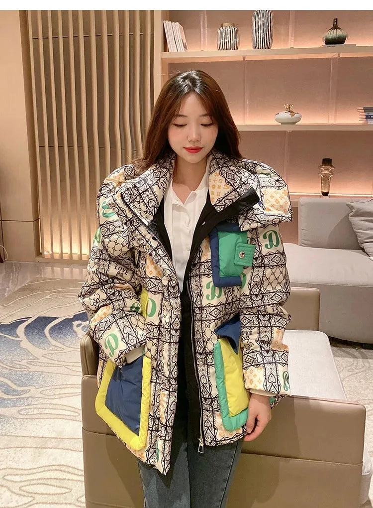 2023 Europäische Station Winter Neue Daunenjacke Damen Warm Mode Kurze Farb-Patchwork Graffiti dicke Weiße Entendaunenjacke