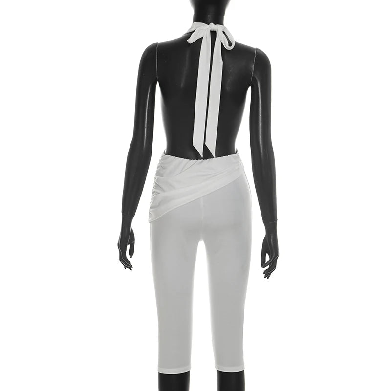 Solid color neck tie, knot, exposed back, tight fitting jumpsuit, cropped pants
