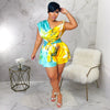 CM.YAYA Damen Batik-Print Strand Ärmellos V-Ausschnitt Schärpen Sexy Party Club Playsuits Jumpsuit 2025 Sommer Einteiler Rompers