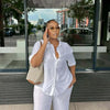 Women Casual Two Piece Pant Set Short Sleeve Turn Down Collar Shirts Top and High Waist Loose Wide Leg Pant Matching Set 2025