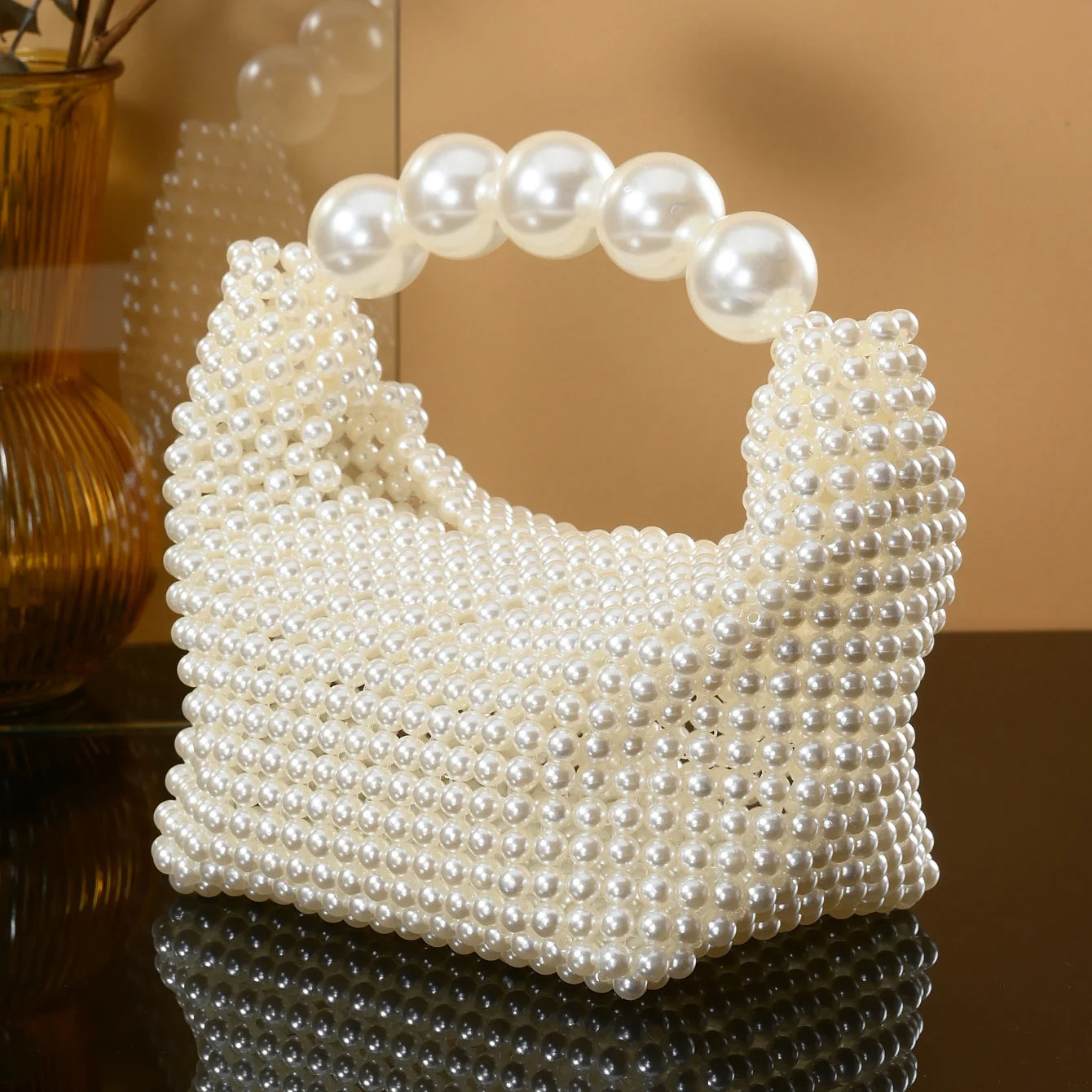 Europäischer und amerikanischer Stil neue Perlenhandtasche Sommer Damen Perlenbeutel handgewebte Handgelenktasche Mode Temperament Handtasche