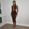 Solid color neck tie, knot, exposed back, tight fitting jumpsuit, cropped pants