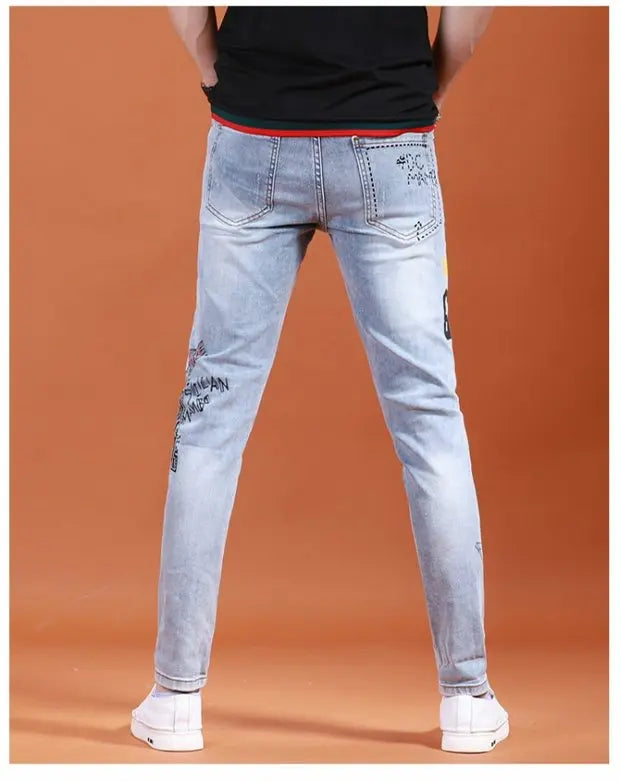 Fashion Printed Jeans Men's Korean Brand Embroidery Badge Pattern Youth Ripped Small Feet Teenagers Cowboy Pencil Pants