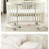 Oval crib Multifunctional pine children's bed European white newborn baby movable splicing bed