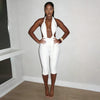 Solid color neck tie, knot, exposed back, tight fitting jumpsuit, cropped pants