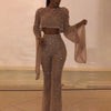 Sexy Backless Hollow Bandage Jumpsuit Women Spring O-neck Flare Sleeve Straight Playsuit Fall Sequin Shiny Party Romper Overalls