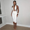 Solid color neck tie, knot, exposed back, tight fitting jumpsuit, cropped pants