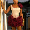 Elegant Ivory Dress With Red Embellishments And Large Rose Accents On Skirt And Shoulder Exudes Glamour And Sophistication Perfe